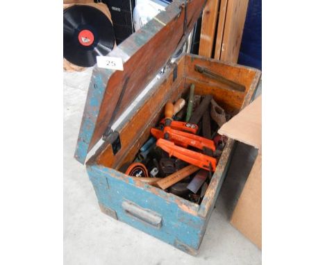 An old pine tool box with tools.