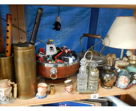 A shelf of brass and copper.