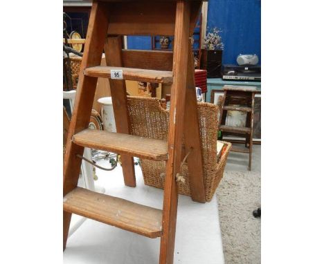 A small pine step ladder.