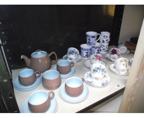 A Langley pottery teaset and selection of floral porcelain cups and saucers etc.