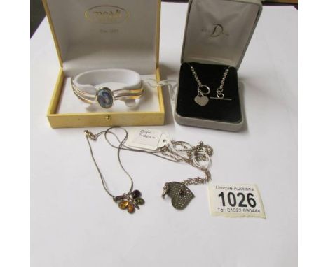 A silver T bar neck chain, 2 silver pendants (one set amber) and an Irish silver plate and enamel bangle.