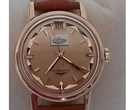 A gents vintage rose gold Longines Conquest Calendar Collectors wristwatch with leather strap, the round copper-colour dial (