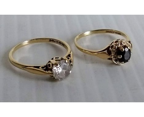 A Victorian single stone ring in a 9ct yellow gold cage setting and another similar with an oval cut sapphire, sizes N, L, bo