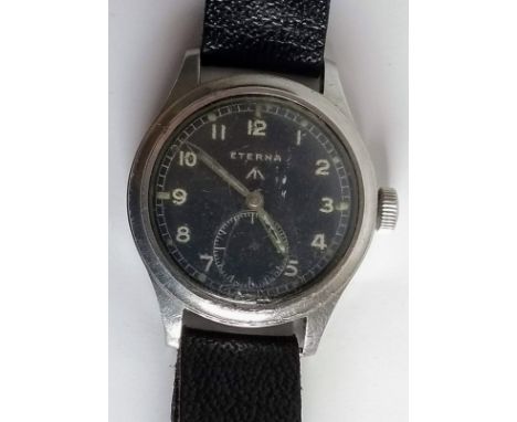 A British military Eterna W.W.W. 1940s manual wind wristwatch, 36mm dial, subsidiary hand detached, but present, in working o