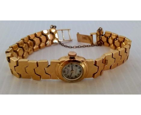 A ladies vintage Perlux dress watch, stamped 18k 750, net weight 21.5g, clasp damaged, in working order