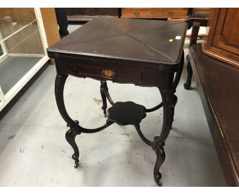 Edwardian mahogany envelope top card table with drawer on carved cabriole legs with undertier
