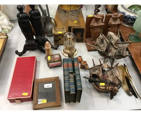 Miscellaneous group of items to include a 1920s spiral turned wooden candlestick, leather box in the form of books,pair of Re