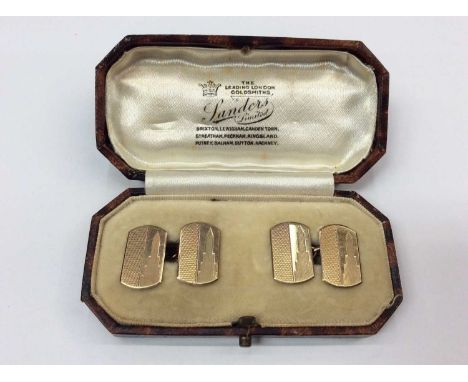 Pair of Art Deco 9ct gold cufflinks with engine turned decoration, possibly depicting the Empire State Building, hallmarked C
