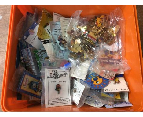 Box of enamel pin badges