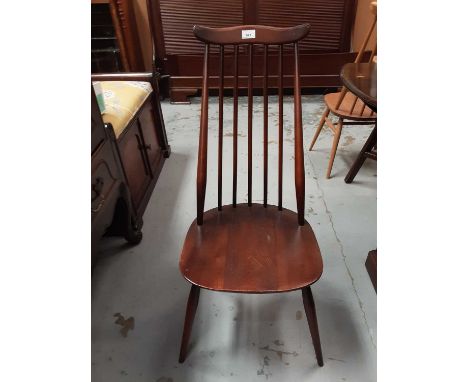 Set of four Ercol stick back chairs