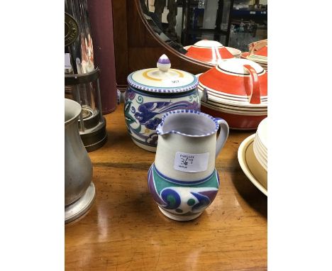 Poole Carter Stabbler Adams biscuit barrel and lid with bluebird decoration and a Poole jug
