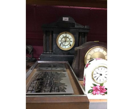 Victorian slate mantel clock with column decoration and three other clocks