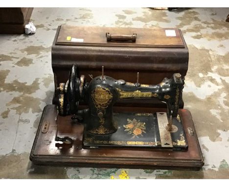 Three vintage sewing machines in cases including Bradbury's