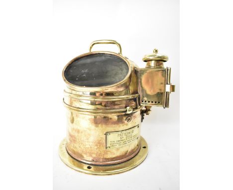 An early/mid 20th century ship's brass Admiralty pattern binnacle hood gimbal compass, with oil lamp illumination port to the