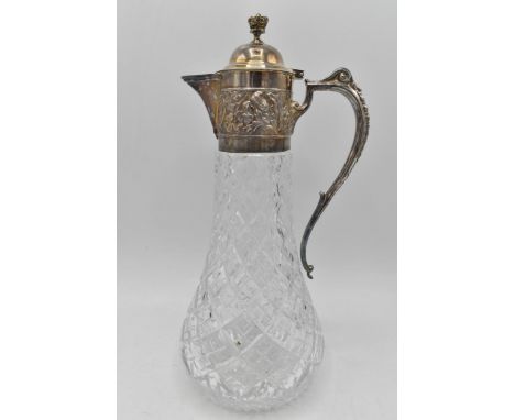 A late 20th century silver topped commemorative claret jug by Payne &amp; Son Sheffield 1977 having a crown shaped finial and