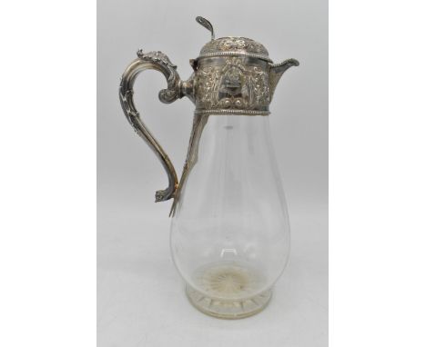 A late 19th century silver topped claret jug by W &amp; G Sissons Sheffield 1886, having a pierced finial with initials to th