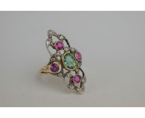 A 9ct gold dress ring, set with a central emerald flanked by four ruby's and diamonds, total weight 4.41gLocation: 