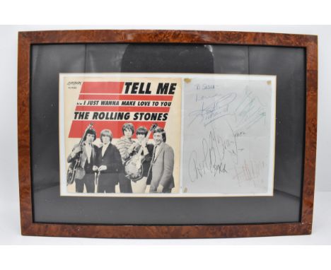 A mounted and framed display of The Rolling Stones autographs 17.5 x 13.5cm, together with a Tell Me I Just Wanna Make Love T