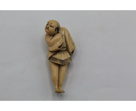 An 18th century Japanese ivory netsuke of a standing Yakkosan, 6.3cm high 