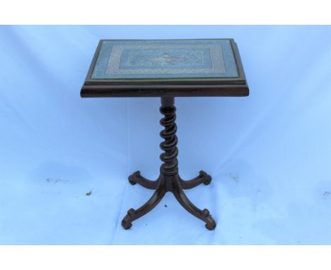 A 19th century micro-mosaic stone topped rosewood table, the panel decorated with a Roman lamp in a rope twist style border, 