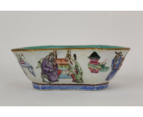 A Chinese Qing dynasty Xianfeng dish with rounded ends and concave sides decorated in polychrome enamels with a scene of scho