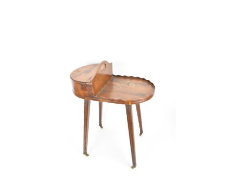 An early 20th century George III design yew butlers plate stand, with a carrying handle, a hinged lid and galleried shelf, on