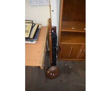 A Terry Griffiths snooker cue plus one other and a copper bed warming pan (3)