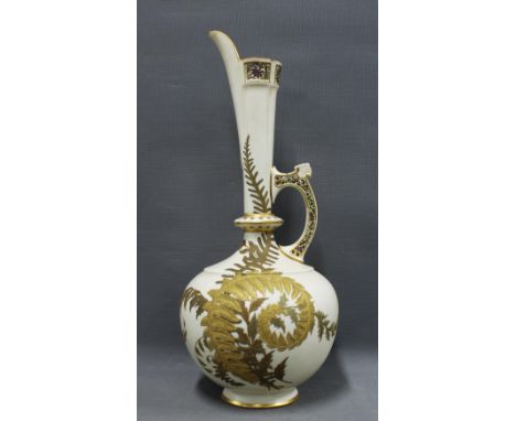 19th century Royal Worcester blush ivory ewer with reticulated rim and handle and gilded with ferns pattern, green printed fa