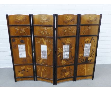 Late 19th / early 20th century Japanese four fold screen of small proportions, each wooden panel decorated with prunus, bambo