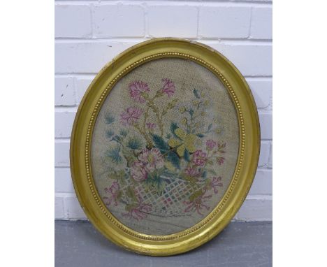 Floral tapestry, dated September 1780, in an  oval gilt frame, 50 x 41cm 