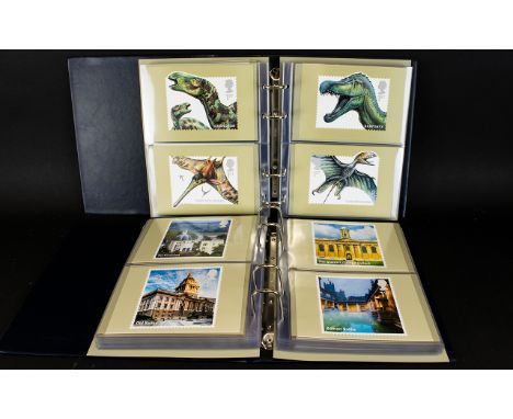 Two Ring Binders containing an assortment of Royal Mail Issue Postcards featuring special stamp issues. Includes Manchester T