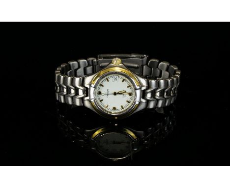 Tissot Titanium T640 Lady Diver 20 ATM Wrist Watch Gold bezel and numerals with cream dial and signature impressed 'T' logo t