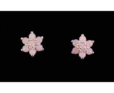 Pink Opal Flower Cluster Earrings, each earring comprising seven round cut pink opals, set in silver, totalling 1.5cts