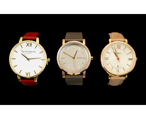 A Small Collection of Contemporary Gold Tone Wrist Watches, Various Brands. All In As Brand New Condition - Never Worn, Still