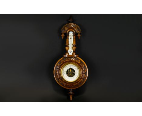 Antique Barometer Wall mounted barometer of small proportions, circular ceramic dial with finial detail to top and bottom. Pl