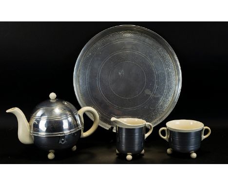 An Original 1930's Ceramic And Stainless Steel Tea Service 'Rosie -Lea' By Conqueror Table Ware Limited' Of typical art deco 