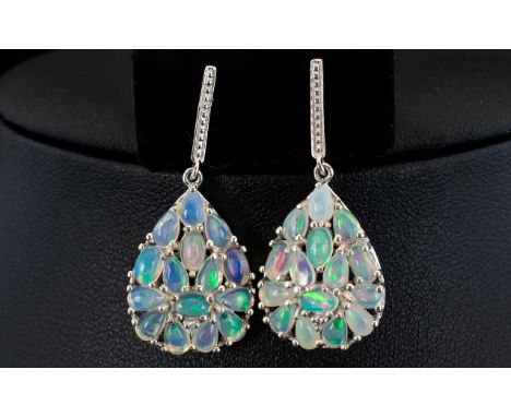 Pair of Opal Cluster Drop Earrings, large pear shaped clusters comprising 4.25cts of oval and pear cut opals with natural whi