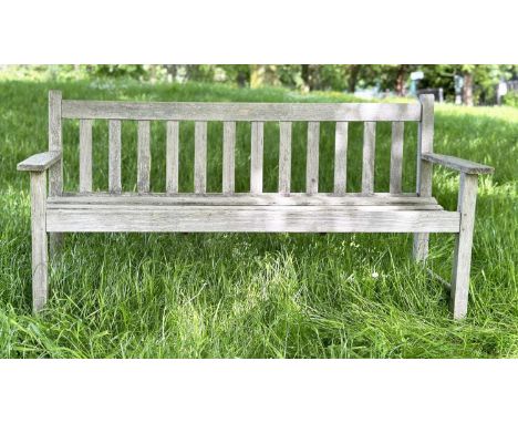 GARDEN BENCH, silvery weathered slatted teak, three seater with flat top arms, 82cm H x 158cm W. 
