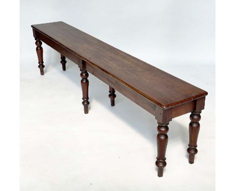 LONG BENCH, early 19th century mahogany rectangular with six turned tapering supports, 183cm W x 30cm D x 46cm H. 