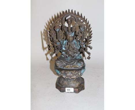 20th Century green / gilt patinated bronze figure of seated Buddha, 14.5ins high 
