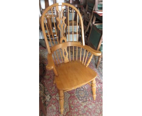 Reproduction beechwood Windsor elbow chair with a hoop, stick and pierced splat back 