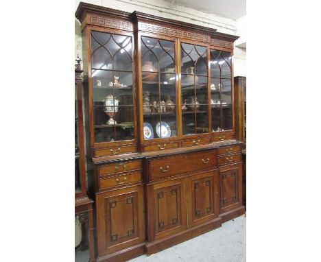 Good quality mid 20th Century mahogany breakfront secretaire bookcase, the dentil and key pattern cornice above four bar glaz