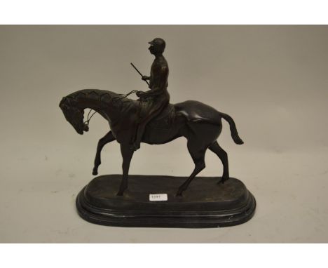 20th Century dark patinated bronze group of a horse and jockey on a marble plinth base, 15.25ins x 16ins 