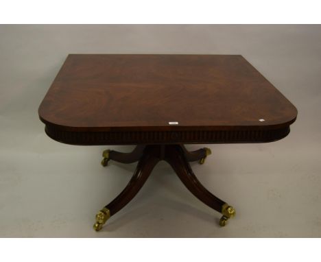 Good quality reproduction mahogany twin pedestal dining table, the crossbanded and line inlaid top above a pair of turned flu