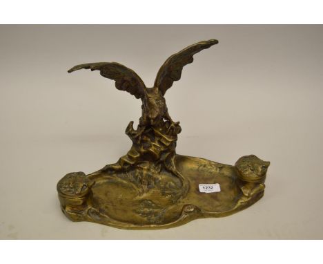 A. Marionnet, late 19th or early 20th Century gilt bronze two bottle ink stand, the naturalistic base surmounted by a figure 