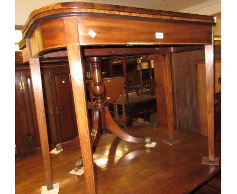 George III mahogany D-shaped fold-over card table with a baize lined interior above a shallow frieze raised on square taperin