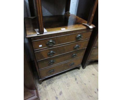 George III mahogany commode adapted for use as a two drawer chest, the moulded top above four faux drawers with oval brass ha