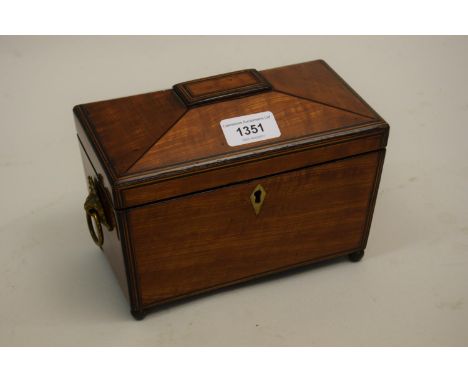 George III satinwood and line inlaid sarcophagus shaped tea caddy, the hinged lid enclosing a two division interior above rin