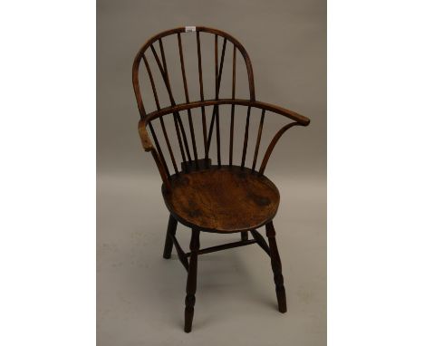 Small 18th / 19th Century yew, ash and elm Windsor elbow chair, the hoop and stick back above a carved panel seat, turned fro