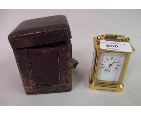 Miniature gilt brass cased carriage clock, the enamel dial with Roman numerals and single train movement, together with a Mor
